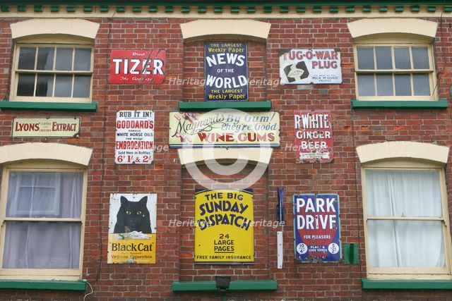 Advertisements on a building, Ross-on-Wye, Herefordshire. Creator: Peter Thompson.