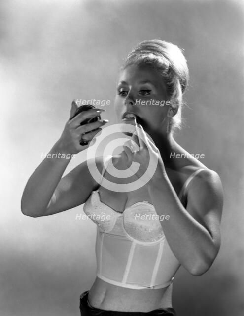 Advertising image for Truline bras, 1963.  Artist: Michael Walters