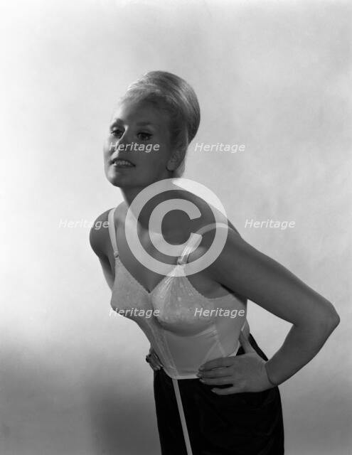 Advertising image for Truline bras, 1963.  Artist: Michael Walters