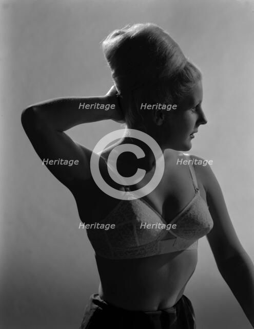 Advertising image for Truline bras, 1963.  Artist: Michael Walters