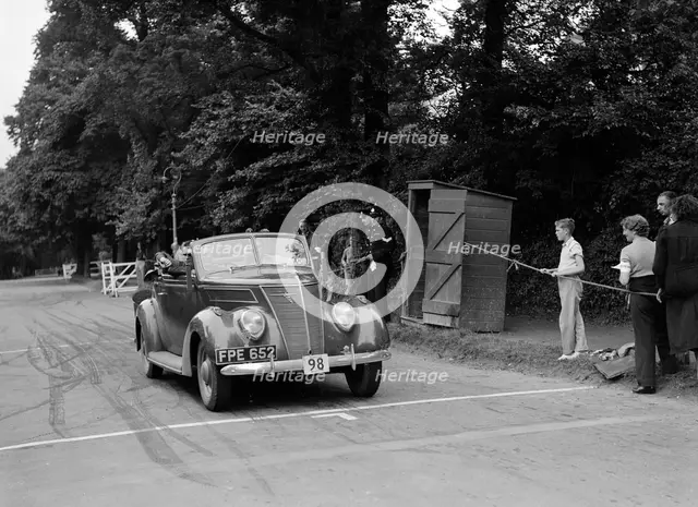 ADC Gordon's Ford V8, winner of a silver award at the MCC Torquay Rally, July 1937. Artist: Bill Brunell.