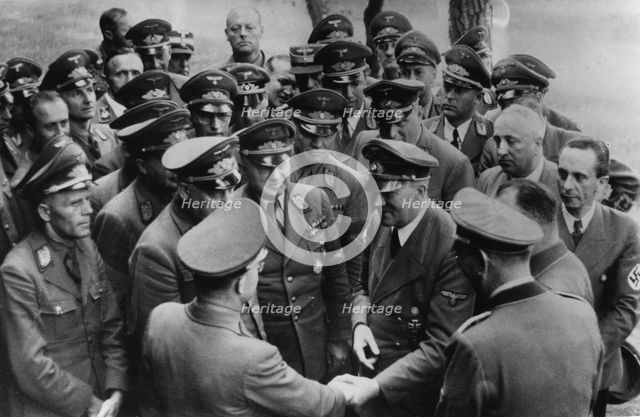Adolf Hitler meeting with senior Nazis, Germany, August 1944. Artist: Unknown