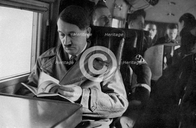 Adolf Hitler on an aeroplane, 1936. Artist: Unknown