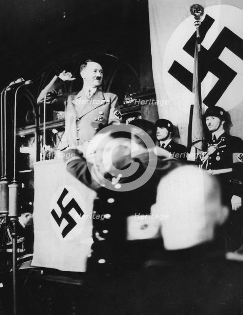 Adolf Hitler at a Nazi rally at Nuremberg, Germany, 1930s.  Creator: Unknown.