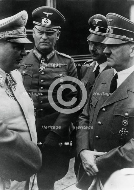Adolf Hitler at his headquarters with senior Nazis on his 52nd birthday, 20 April 1941. Artist: Unknown