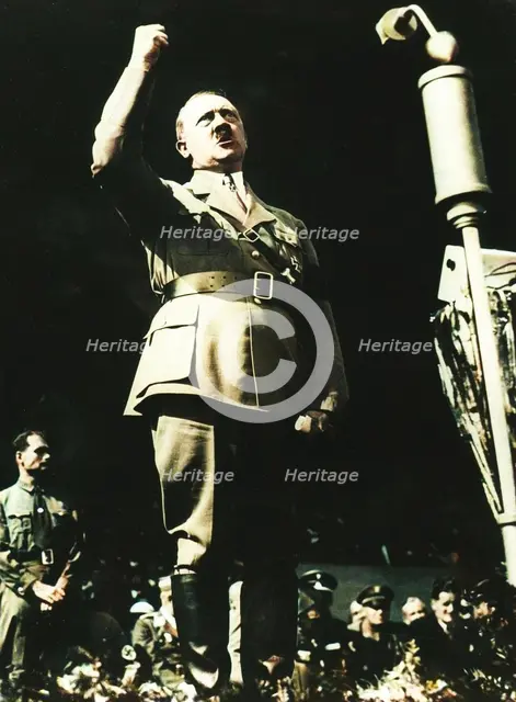 Adolf Hitler addressing a Nazi rally at Nuremberg, Germany, 1930s.  Creator: Unknown.