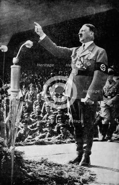 Adolf Hitler addressing a rally, c1930s. Artist: Unknown