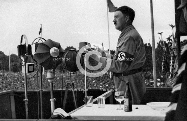 Adolf Hitler addressing the German people at the Nuremberg Rally, Germany, 1935. Artist: Unknown