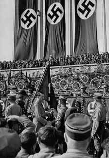 Adolf Hitler dedicates new standards, Nuremberg Rally, Germany, 1934