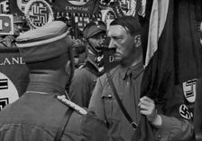 Adolf Hitler dedicating standards at the Nuremberg Rally, Germany, 1935