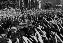 Adolf Hitler departing after making a speech, Berlin, Germany, 1 May 1934
