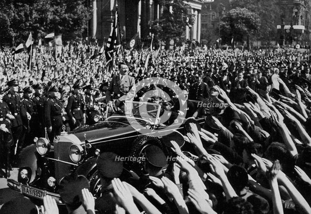 Adolf Hitler departing after making a speech, Berlin, Germany, 1 May 1934. Artist: Unknown