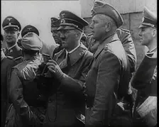 Adolf Hitler Holding a Pair of Binoculars and Standing With a Group of German Military Officers,1939 Creator: British Pathe Ltd