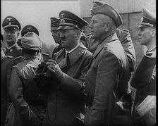 Adolf Hitler Holding a Pair of Binoculars and Standing With a Group of German Military Officers,1939 Creator: British Pathe Ltd