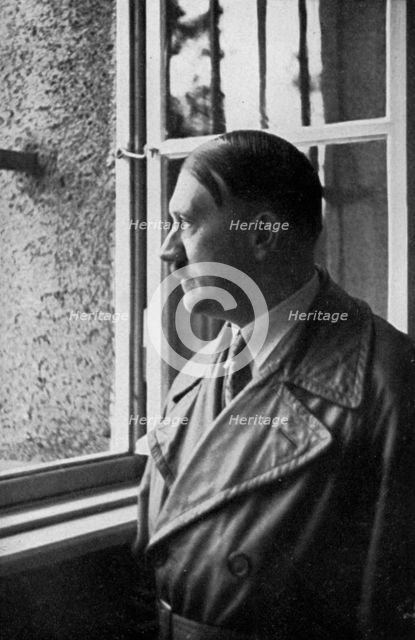 Adolf Hitler looks out of his cell window at Landsberg Fortress, Bavaria, Germany, 1934. Artist: Unknown