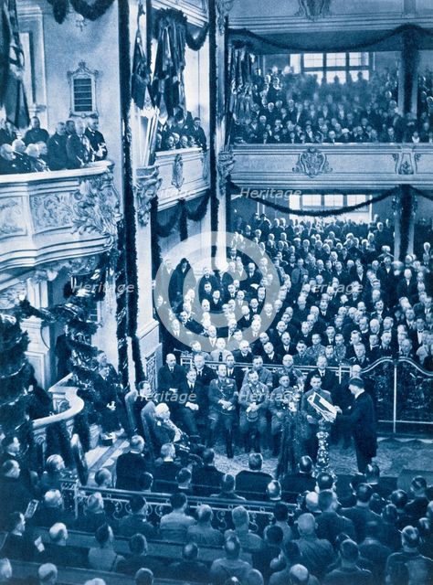 Adolf Hitler reads the Enabling Law in the Garrison Church at Potsdam, 21st March 1933. Artist: Unknown