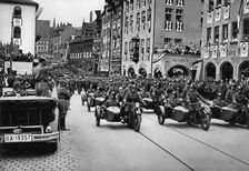 Adolf Hitler reviewing motorcycle troops at the Nuremberg Rally, Germany, 1935