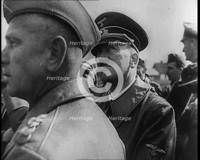 Adolf Hitler Standing With a Group of Other Male German Military Commanders, 1939. Creator: British Pathe Ltd.