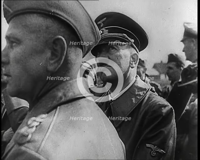 Adolf Hitler Standing With a Group of Other Male German Military Commanders, 1939. Creator: British Pathe Ltd.