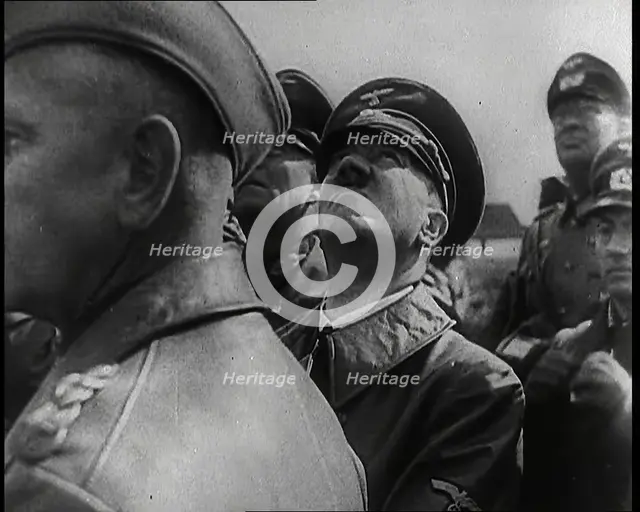 Adolf Hitler Standing With a Group of Other Male German Military Commanders and Looking Upwards,1939 Creator: British Pathe Ltd.