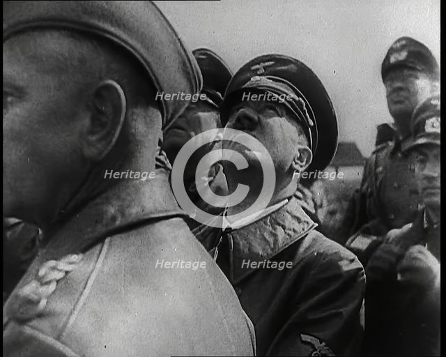 Adolf Hitler Standing With a Group of Other Male German Military Commanders and Looking Upwards,1939 Creator: British Pathe Ltd.