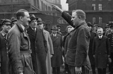Adolf Hitler saluted by a representative of the staff of a factory, Germany, 1936