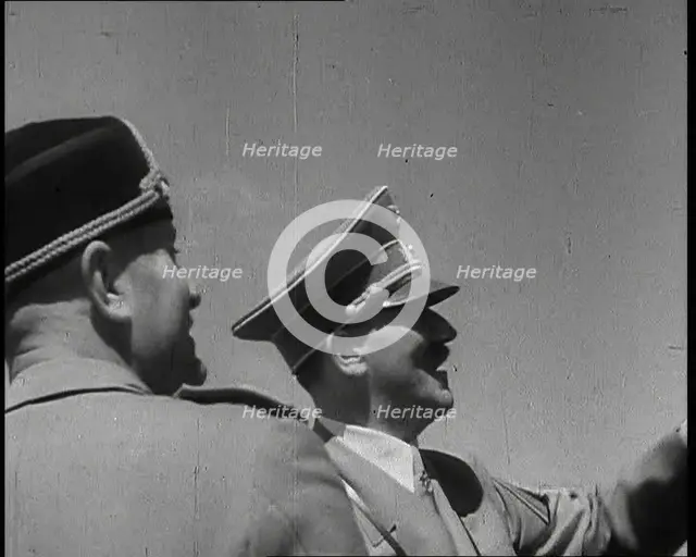 Adolf Hitler, the German Leader, and Benito Mussolini, the Italian Leader, talking, 1937. Creator: British Pathe Ltd.
