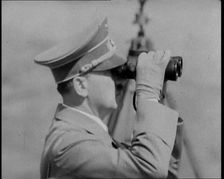 Adolf Hitler, the German Leader Looking Through Binoculars at Army Manoeuvres, 1937. Creator: British Pathe Ltd