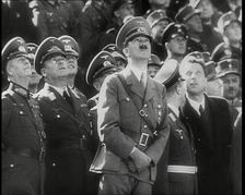 Adolf Hitler, the German Leader Looking Upwards and Watching a Fly Past of Aeroplanes..., 1939. Creator: British Pathe Ltd