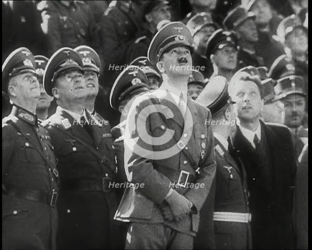 Adolf Hitler, the German Leader Looking Upwards and Watching a Fly Past of Aeroplanes..., 1939. Creator: British Pathe Ltd.