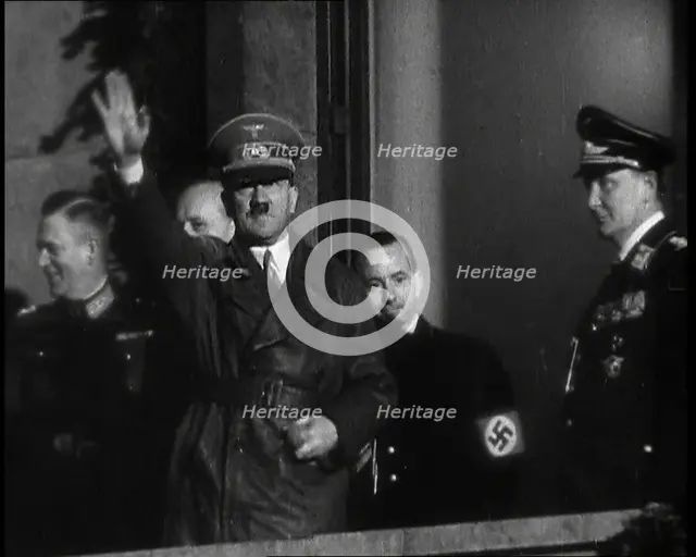 Adolf Hitler, the German Leader, Saluting the Crowd with Hermann Goering and..., 1937. Creator: British Pathe Ltd.