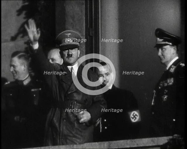 Adolf Hitler, the German Leader, Saluting the Crowd with Hermann Goering and..., 1937. Creator: British Pathe Ltd.