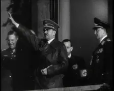 Adolf Hitler, the German Leader, Saluting the Crowd with Hermann Goering and..., 1937. Creator: British Pathe Ltd