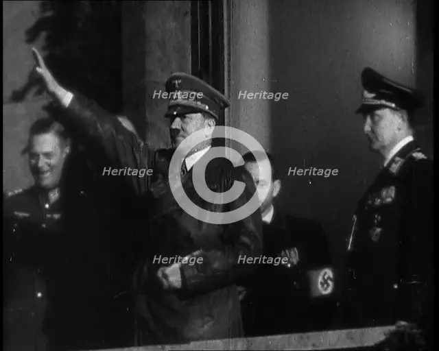 Adolf Hitler, the German Leader, Saluting the Crowd with Hermann Goering and..., 1937. Creator: British Pathe Ltd.