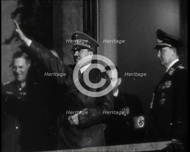 Adolf Hitler, the German Leader, Saluting the Crowd with Hermann Goering and..., 1937. Creator: British Pathe Ltd.