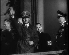Adolf Hitler, the German Leader, Saluting the Crowd with Hermann Goering and..., 1937. Creator: British Pathe Ltd