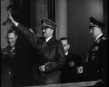 Adolf Hitler, the German Leader, Saluting the Crowd with Hermann Goering and..., 1937. Creator: British Pathe Ltd