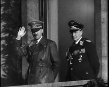 Adolf Hitler, the German Leader, Saluting the Crowd with Hermann Goering on the...,1937 Creator: British Pathe Ltd