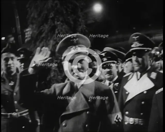 Adolf Hitler, the German Leader with Arm Raised in Salute With Various Male..., 1937. Creator: British Pathe Ltd.
