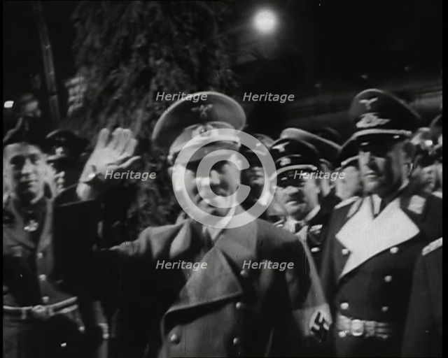 Adolf Hitler, the German Leader with Arm Raised in Salute With Various Male..., 1937. Creator: British Pathe Ltd.