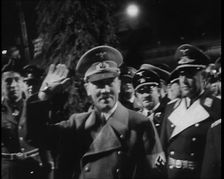 Adolf Hitler, the German Leader with Arm Raised in Salute With Various Male..., 1937. Creator: British Pathe Ltd