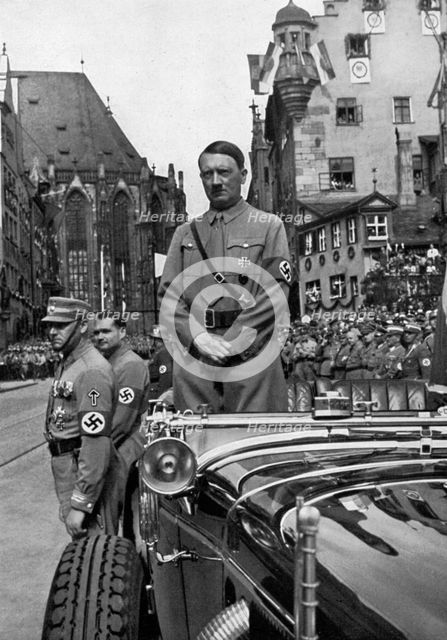 Adolf Hitler waiting for SA 'Brownshirts', Nuremberg, Germany, 1935. Artist: Unknown