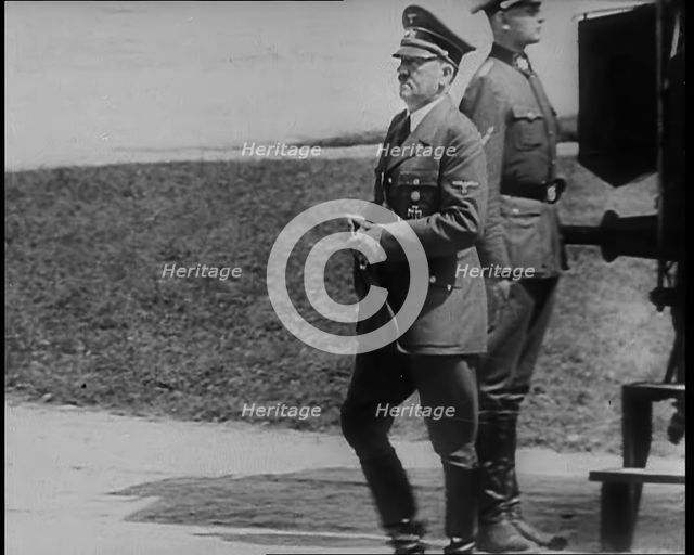 Adolf Hitler Walking Away from the 1918 Armistice Train Car at  Compiegne After the French..., 1940. Creator: British Pathe Ltd.