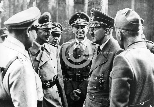 Adolf Hitler with Benito Mussoloni and senior Nazis, 1944. Artist: Unknown