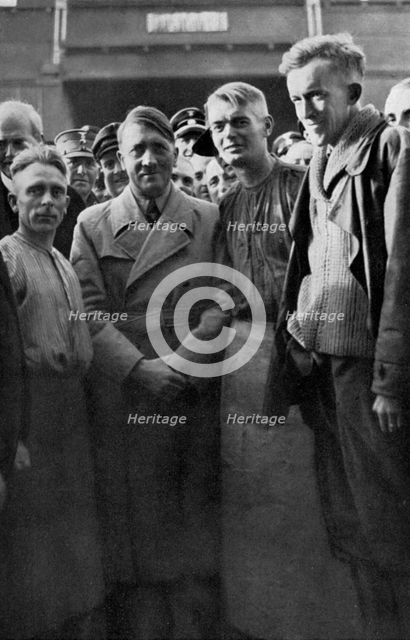 Adolf Hitler with the workers of Siemensstadt, Berlin, Germany, 1936. Artist: Unknown