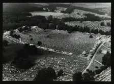 Aerial view of crowds at the Knebworth pop festival, 1986. Creator: Denis Williams