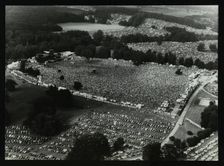 Aerial view of crowds at the Knebworth pop festival, 1986. Creator: Denis Williams