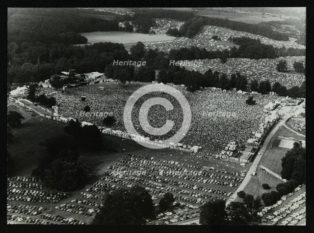 Aerial view of crowds at the Knebworth pop festival, 1986. Creator: Denis Williams.