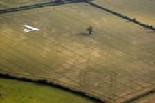 Aeroplane flying over Down Ampney, Gloucestershire, 2006. Artist: Peter Horne