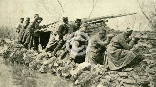 'After the Rains: Serbian Infantry...during the Floods', First World War, c1915, (c1920).  Creator: Unknown.
